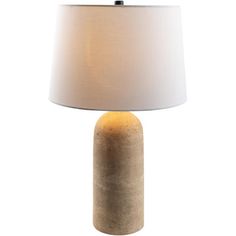 a table lamp with a white shade on it and a light bulb in the middle