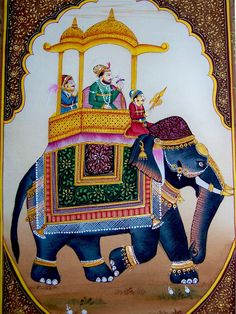 an elephant with people riding on it's back in front of a wall painting