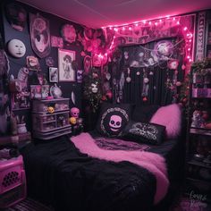 a bedroom decorated in pink and black with skulls on the walls, lights, and decorations