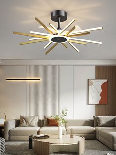 the modern living room is decorated in white and beige tones with an unusual ceiling light