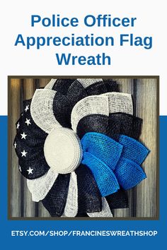 the police officer appreciation flag wreath is shown in blue, white and black with stars on it