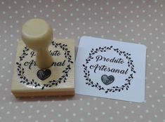 a rubber stamp with a heart on it next to a piece of paper that says predictatio orfesanal