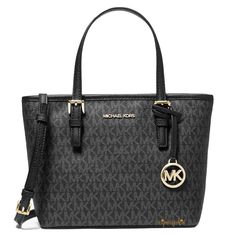 MICHAEL MICHAEL KORS  Jet Set Travel Extra Small Carryall Top Zip Tote Convertible Logo Bag  Black Style# 35T9GTVT0B Product Info Composition: PVC Details: PVC coated canvas logo print, gold-tone hardware, top handles,  top zip closure, interior one zip and open slip pockets, exterior back open slit pocket, fabric lined, logo details Please note: this bag comes without the MK dust bag   Approximate measurements: 8.6" bottom & 10" top(L)/ 7.4"(H)/ 4"(W)  COLOR: Black RETAIL PRICE: $448.00 Michael Corse Bags, Silver Theme, Small Tote Bag, Zip Tote, Bags Logo, Small Tote, Travel Tote, Kors Jet Set, Black Bag