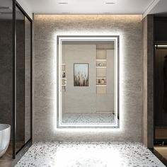 a bathroom with a large mirror on the wall next to a bathtub and sink