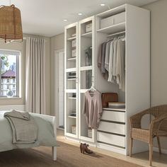 a bedroom with a bed, chair and closet in the corner next to a window