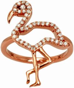 a rose gold flamingo ring with diamonds in the shape of a heart, on a white background