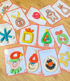 several cards with different shapes and numbers on them