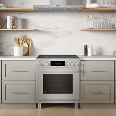 a kitchen with an oven, counter tops and shelves on the wall next to it