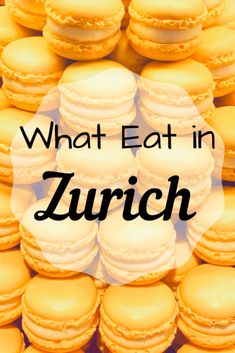 yellow macaroons with the words, what eat in zurich on top of them