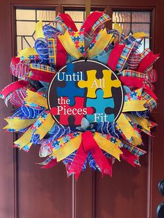 a colorful wreath that says until all the pieces fit