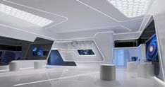 the interior of a futuristic space station with white walls and ceiling lights on either side