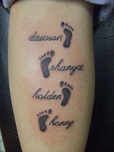 an image of a tattoo with footprints and words on it