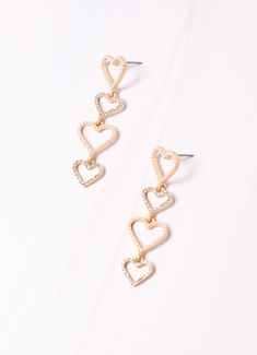 This lightweight heart drop earring is outlined in pearls and CZs on a post back. A great little earring to dress up your outfit! Dimensions: 2" long