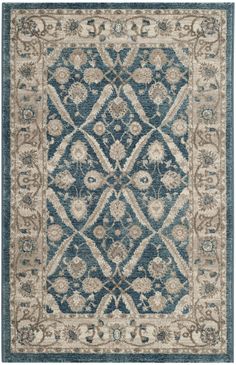 a blue and beige rug with an ornate design