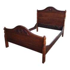 an old wooden bed frame with no headboard and foot board on the bottom end