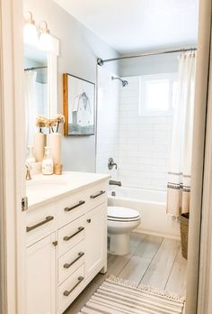 the bathroom is clean and ready to be used as a guest room or family room