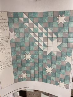 a piece of paper that has been made into a quilt