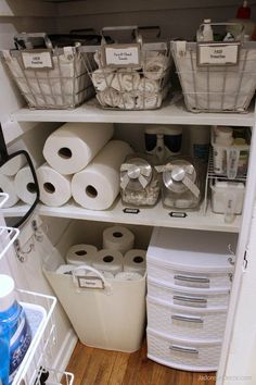 an organized pantry with toilet paper and other items