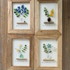 four framed pictures with flowers in vases and words on the bottom, below them