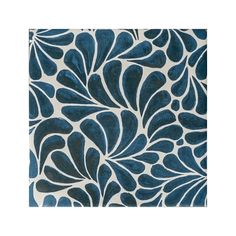 a blue and white rug with an abstract design