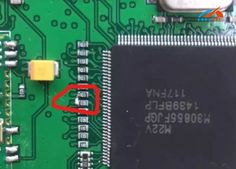 the chip is located on top of the motherboard, and there are two wires attached to it