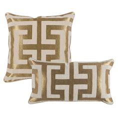 two pillows with gold and white designs on the front, one has a square shape