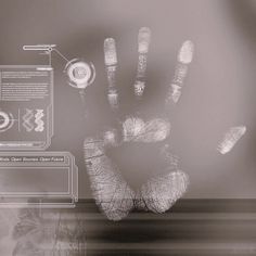 a person's hand is shown in front of a screen with information on it