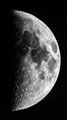 the moon is shown in black and white