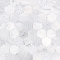 white marble hexagonal tiles with grey dots