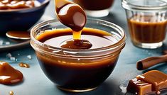 caramel sauce being drizzled into a glass bowl with chocolate on the side