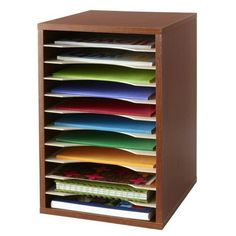 a wooden file cabinet filled with files and folders