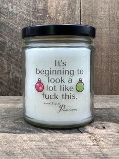 a glass jar with a quote on it