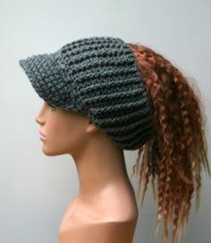 a mannequin head wearing a knitted hat