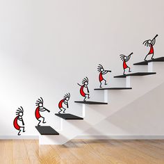 a set of stairs with stickers depicting people dancing on them