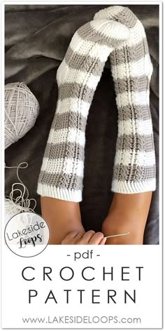 the legs and ankles of a doll are shown with knitting needles in front of them