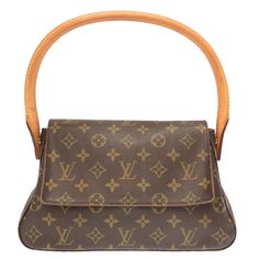 AUTHENTIC LOUIS VUITTON M51147 Monogram Mini Looping Hand Bag 0347 Description Store Item No. 3J0347PB5 Brand LOUIS VUITTON Type Mini Looping/Monogram Model No. M51147 Code MI0041 Country of Manufacture France Production year 2001 Size(CM) W28cm x H16cm x D9cm Handle:52cm Size(Inch) W11.0 x H6.3 x D3.5inch Handle:20.5inch Color Brown Metal Colur Gold Material MonogramCanvasxMonogramCanvas Style Hand Bag come with None Spec [Inside] Zipper pocket x 1 Condition Total ABrank There are Stain / Scrap 70s Fashion Pictures, Monogram Models, Cute Bags, Sell Items, Women's Bags, Hand Bag, Luxury Items, Authentic Louis Vuitton, Online Womens Clothing