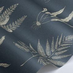 an image of a wallpaper with leaves and birds on the blue colorway background