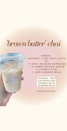 a person holding up a cup with ice cream in it and the words brown butter chai above it