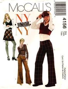 two women in plaid pants and sweaters, one is wearing a white shirt with black stripes