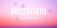 the word mozzafiato is written in white on a blurry pink and purple background