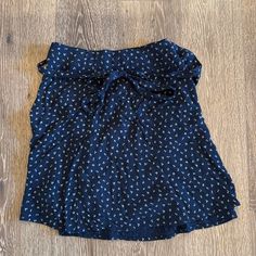 Never Worn Wrap Skirt From Brandy Melville. Navy Blue With Little Flowers. O/S. Attached Picture From Website Of Same Skirt, Different Color. Brandy Melville Skirt, Brandy Melville Skirts, Little Flowers, Wrap Skirt, Brandy Melville, Brandy, Womens Skirt, Color Blue, Navy Blue