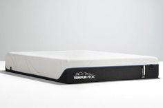 the tempur - pedic mattress is shown on a white surface