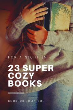 a woman holding a book with the title for a night in 23 super cozy books