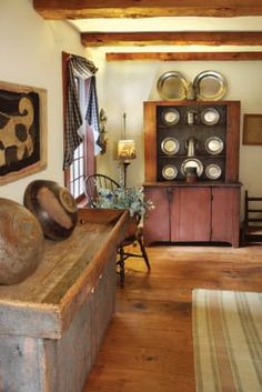 a living room filled with furniture and decor