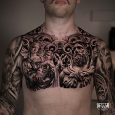 a man with many tattoos on his chest