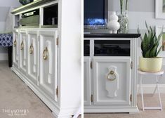 a white entertainment center in a living room next to a potted houseplant