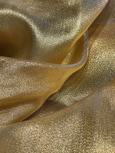 a close up view of gold fabric