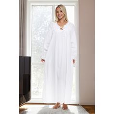 Step into a world of timeless elegance with the Alexander Del Rossa Victorian Nightgown. This exquisite piece is crafted from 100% premium cotton, ensuring both comfort and durability. The breathable, lightweight fabric makes it perfect for year-round lounging.

- Material: 100% Cotton
- Color: White
- Size: XS, available in petite, regular, and plus sizes
- Gender: Female
- Features: Round, elasticized neckline with ruffle details and keyhole opening with tie, long raglan sleeves with elasticiz Elegant Cotton Sleepwear For Relaxation, Elegant Cotton Sleepwear, White Cotton Bedtime Robe, Elegant Cotton Robe For Daywear, Elegant Cotton Daywear Robe, Elegant Cotton Nightgown For Bedtime, Elegant Cotton Nightgown For Daywear, Cotton Nightgowns, Nightgown Vintage