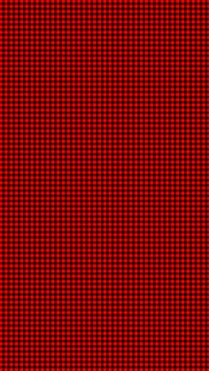 a red and black checkered pattern with white dots