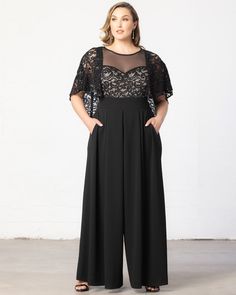 Make an unforgettable entrance at your next special occasion in our Alluring Sequins Formal Jumpsuit. This elegant plus size jumpsuit features a black sequined sparkly lace bodice with draped sleeves and an illusion sweetheart neckline. Wide leg pleated pants flow gracefully to the floor, mimicking the lines of an A-line gown. A center back zipper allows you to step in and out of this cocktail pant suit without mussing hair or makeup. This one-piece dressy jumpsuit is ideal for evening events, w Mother Of The Bride Black, Wide Leg Pleated Pants, Elegant Plus Size, Formal Jumpsuit, Draped Sleeves, Sequin Jumpsuit, Jumpsuit Dressy, Drape Sleeves, Plus Size Jumpsuit